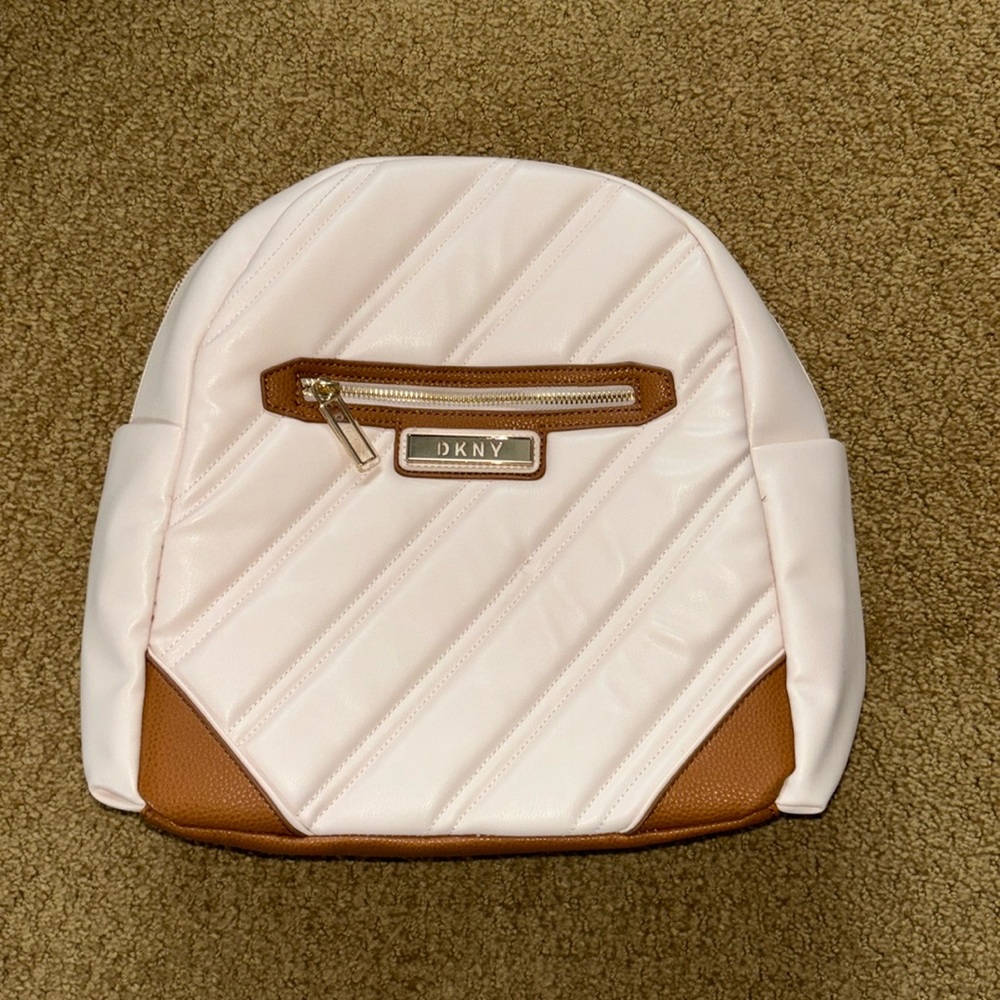Brand new still with plastic and tags DKNY backpack!